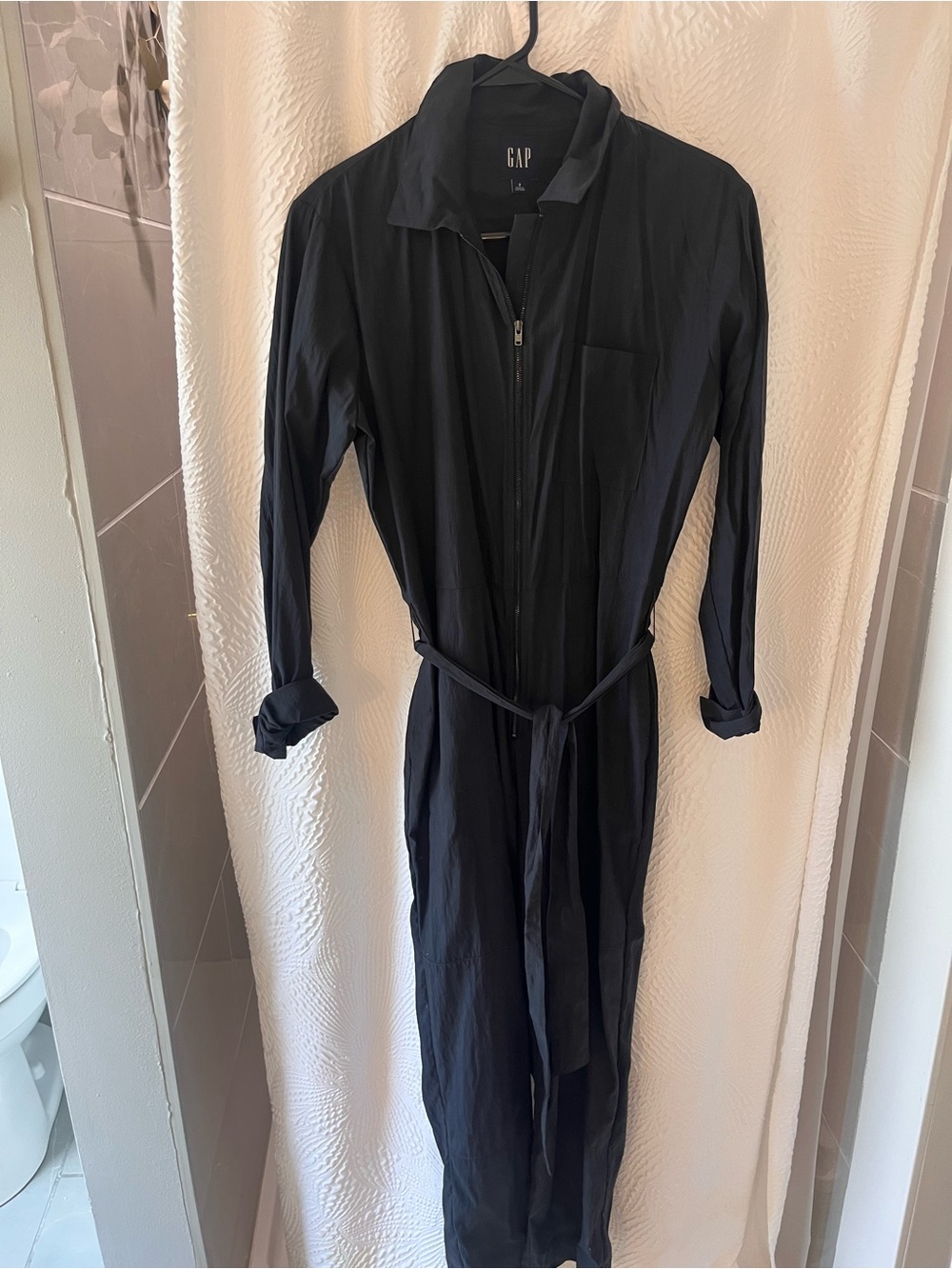 GAP Women’s charcoal long sleeve jumpsuit